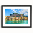 Colorful abstract art print of Sicilian landscape in vibrant hues on a large framed canvas, ideal for living room decor.