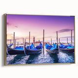 Framed canvas featuring a vintage-style landscape painting of Venice with muted gold and black tones.