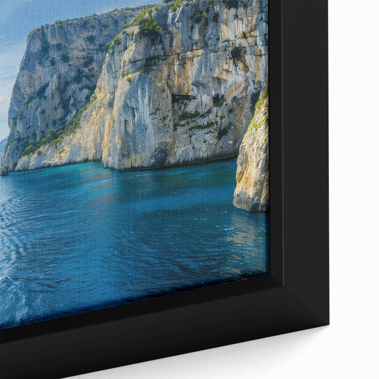Framed canvas of a Mediterranean Sea scene in black with colorful, textured details.