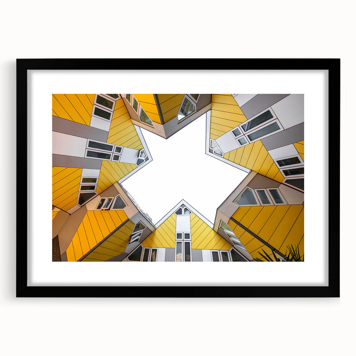 Colorful abstract art print of a European scenery in a black frame, ideal for living room decor.