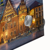 Large abstract wall art featuring a European scenery in muted blue and green tones on acrylic glass.