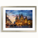 Extra large abstract art print of a European scenery in muted earth tones, framed in silver, suitable for living room decor.