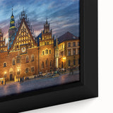 Close-up of a black framed canvas featuring a textured, colorful European scenery, ideal for living room decor.