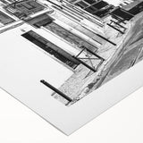 Art deco poster of Lisbon scenery in muted blue and white tones on rolled canvas, suitable for dining room wall art.