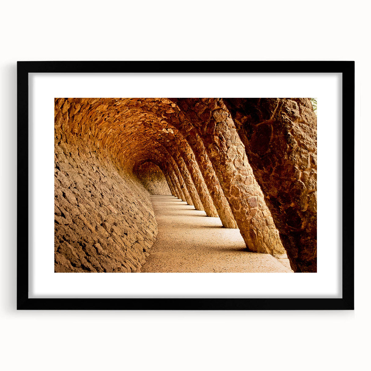 Extra large abstract art print of colorful Barcelona scenery on textured canvas, framed in black.