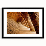 Extra large abstract art print of colorful Barcelona scenery on textured canvas, framed in black.