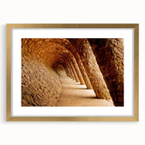 Abstract art print of Barcelona with gold frame and mat, featuring muted earth tones, ideal for dining room decor.