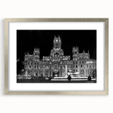 Textured abstract art print of Madrid scenery in muted earth tones, framed with a silver mat, suitable for bedroom decor.