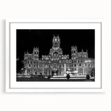 Abstract art print of Madrid skyline in muted gray and blue tones on a white framed canvas, suitable for dining room decor.