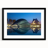 Colorful abstract art print of Valencia scenery in black frame, featuring vibrant hues and textures.