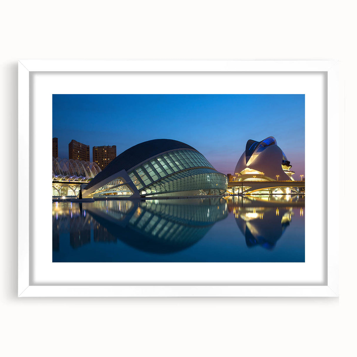 Abstract art print of Valencia scenery in muted earth tones, framed in white, suitable for dining room decor.