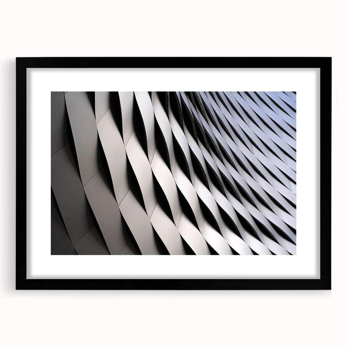 Extra large abstract art print of a colorful European scenery in Switzerland, framed with a black mat.