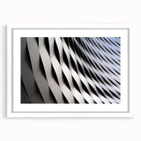 Abstract art print of a European Swiss landscape in muted earth tones, framed with a white mat.