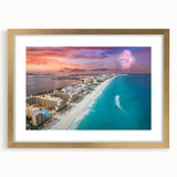 Extra large abstract art print of Cancun scenery in gold frame, featuring textured blue and green hues.