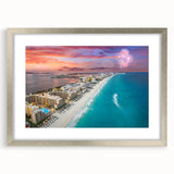 Textured abstract art print of Cancun scenery in muted blue and green, framed in silver, ideal for bedroom art.