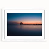 Abstract art print of Oaxaca scenery in muted earth tones on a framed white mat, suitable for dining room decor.