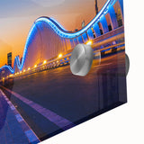 Large abstract depiction of Dubai skyline in muted earth tones on acrylic glass.