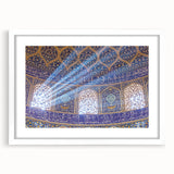 Abstract art print depicting a Middle Eastern scenery in muted earth tones on a framed white mat.