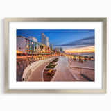 Textured abstract art print of Tel Aviv skyline in muted earth tones, framed with a silver matte, ideal for bedroom art.