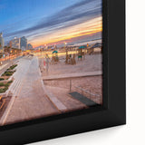 Framed canvas of Tel Aviv skyline in textured black with vibrant color accents, ideal for large living room walls.