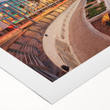 Art deco poster of Tel Aviv skyline in muted earth tones on rolled canvas, suitable for dining room decor.