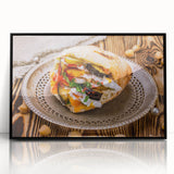 Large abstract wall art depicting a Middle Eastern scenery in muted earth tones, framed in black acrylic.