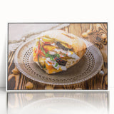 Acrylic print of a Middle Eastern landscape in muted earth tones, framed in white.