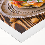 Art deco poster featuring a Middle Eastern scenery in muted earth tones on a rolled canvas, suitable for dining room decor.