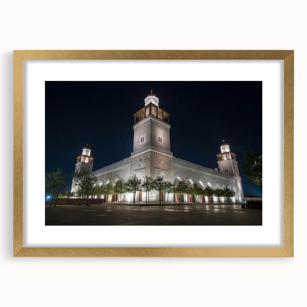 Extra large abstract art print of a Middle Eastern scenery in muted earth tones on a textured canvas, framed in gold.