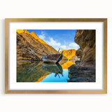 Extra large abstract art print of a Middle Eastern scenery, textured with gold hues on a framed canvas.
