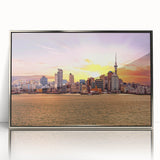 Mid-century modernist art of Auckland skyline in muted blue tones on a silver-framed acrylic print.