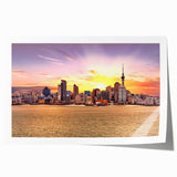 Art deco poster of Auckland skyline in muted blue and gray tones on rolled print, suitable for dining room wall art.
