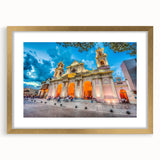 Extra large abstract art print featuring textured scenery of South America in a gold frame, suitable for living room decor.