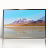 Mid-century modernist art depicting a Bolivian landscape in muted earth tones on a silver-framed acrylic.