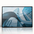 Large abstract wall art featuring a stylized Santiago cityscape in muted earth tones on a black framed acrylic.