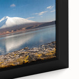Extra large framed canvas featuring a textured depiction of a scenic Chilean landscape in black with colorful art accents.