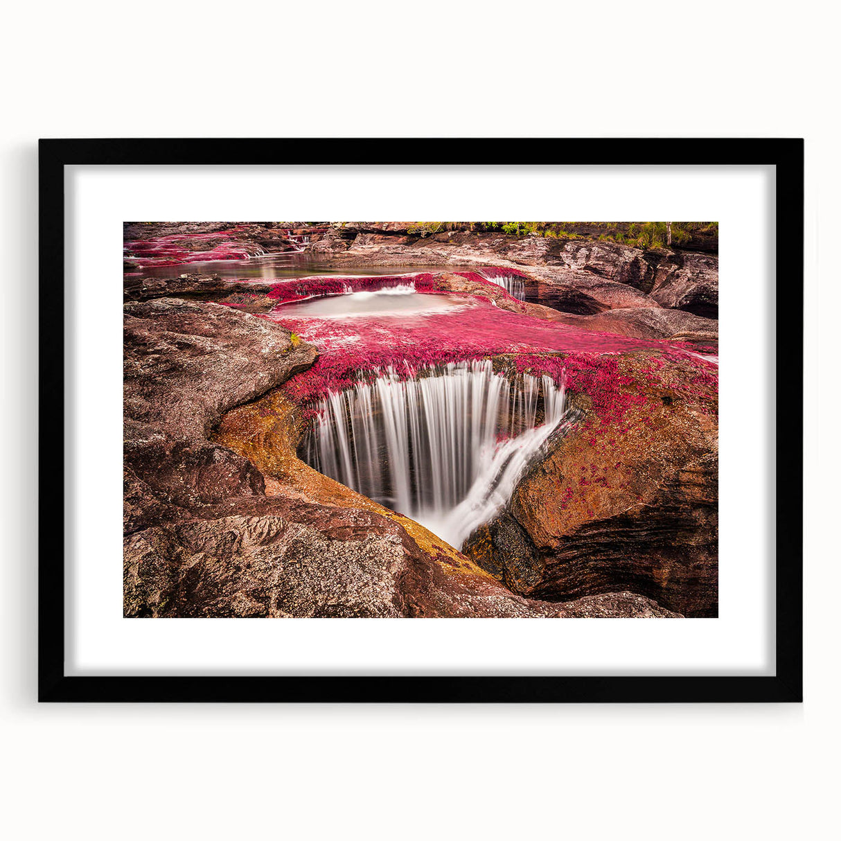 Extra large abstract art print depicting a textured, colorful Colombian landscape, framed in black.