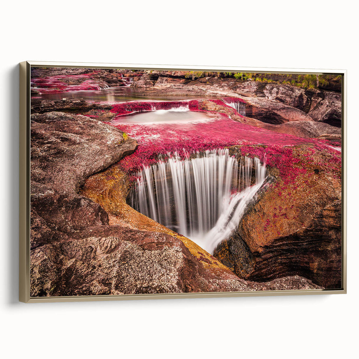 Framed canvas featuring a vintage-style landscape painting of a Colombian scenery in black and gold tones.