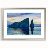 Textured abstract art print of Galapagos scenery in muted earth tones, framed in silver, ideal for bedroom art.
