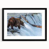 Abstract art print of Alaskan scenery in vibrant colors on textured canvas, framed in black, ideal for living room decor.
