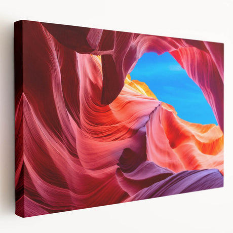 Antelope Canyon in Arizona depicted on a large stretched canvas with rich orange and red tones.