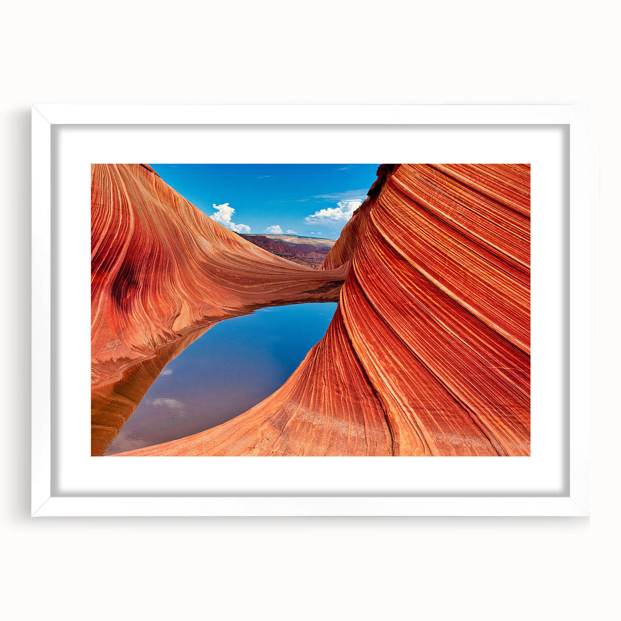 Abstract art print of Coyote Buttes in Arizona, with muted earth tones on a white framed canvas.