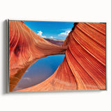 Framed canvas of Coyote Buttes in Arizona displaying vibrant red and orange landscape.
