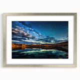 Textured abstract art print of Lake Powell in muted earth tones on a framed silver mat, suitable for bedroom decor.