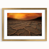 Extra large wall art of an abstract depiction of Death Valley in textured shades of orange and brown, framed in gold.