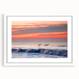 Abstract art print of Santa Barbara coastline in muted blue and green shades on a framed white mat.