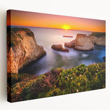 Large art depicting the Santa Cruz coastline on stretched canvas, featuring muted blue and sandy hues.
