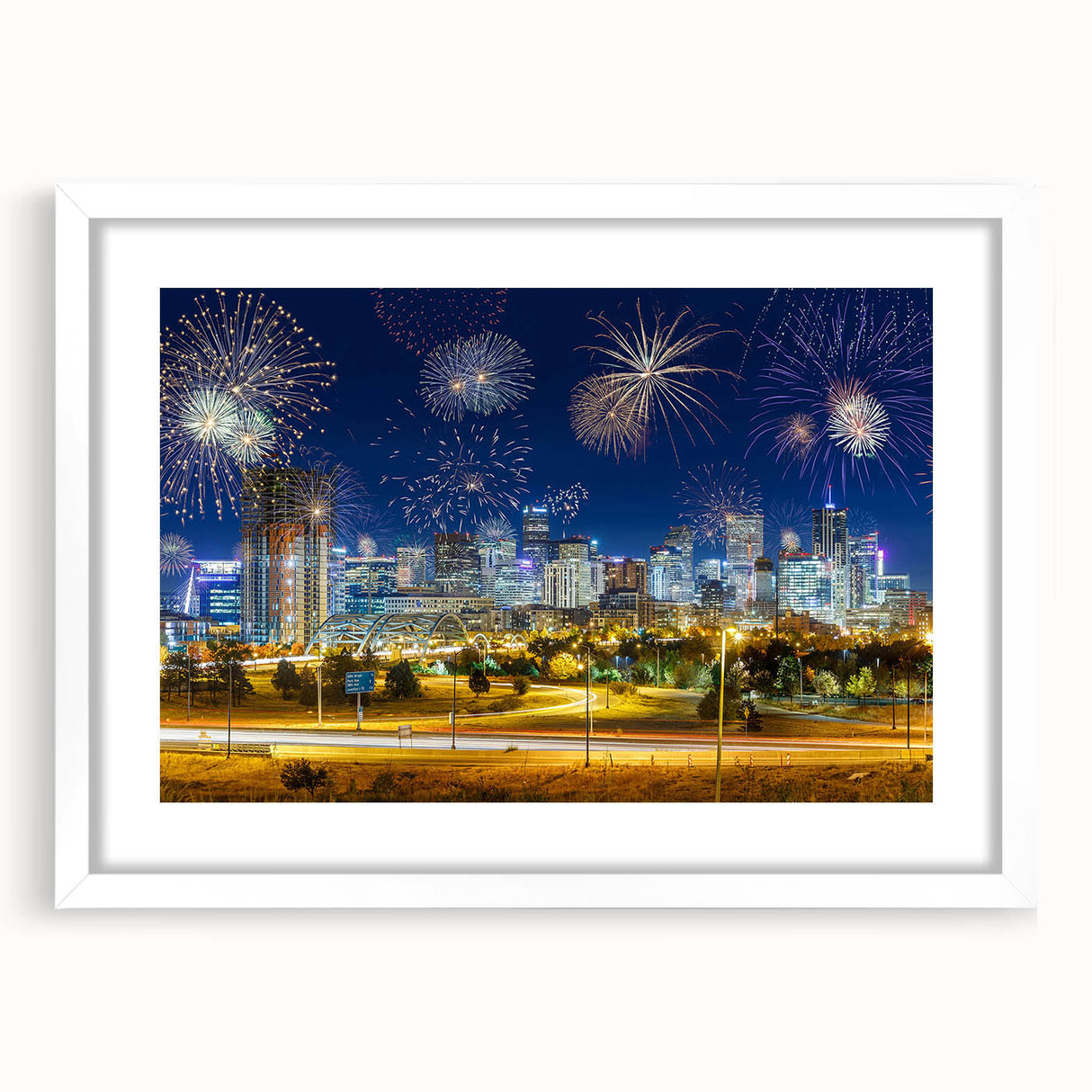 Abstract art print of Denver skyline in muted gray and blue tones on a framed white mat, ideal for dining room decor.