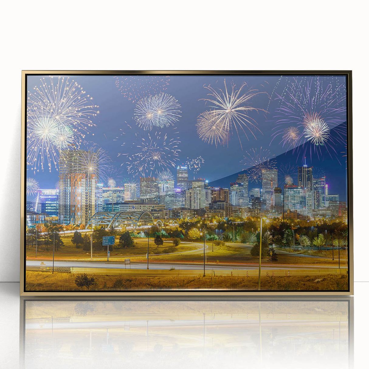 Large art print of Denver skyline in mid-century modernist style on framed acrylic, featuring gold and blue tones.