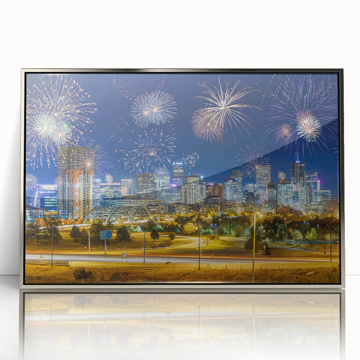 Mid-century modernist art depicting Denver skyline in muted colors on a silver-framed acrylic print.